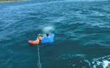 Deniz yatağıyla sürüklenen çocuğu Sahil Güvenlik k...